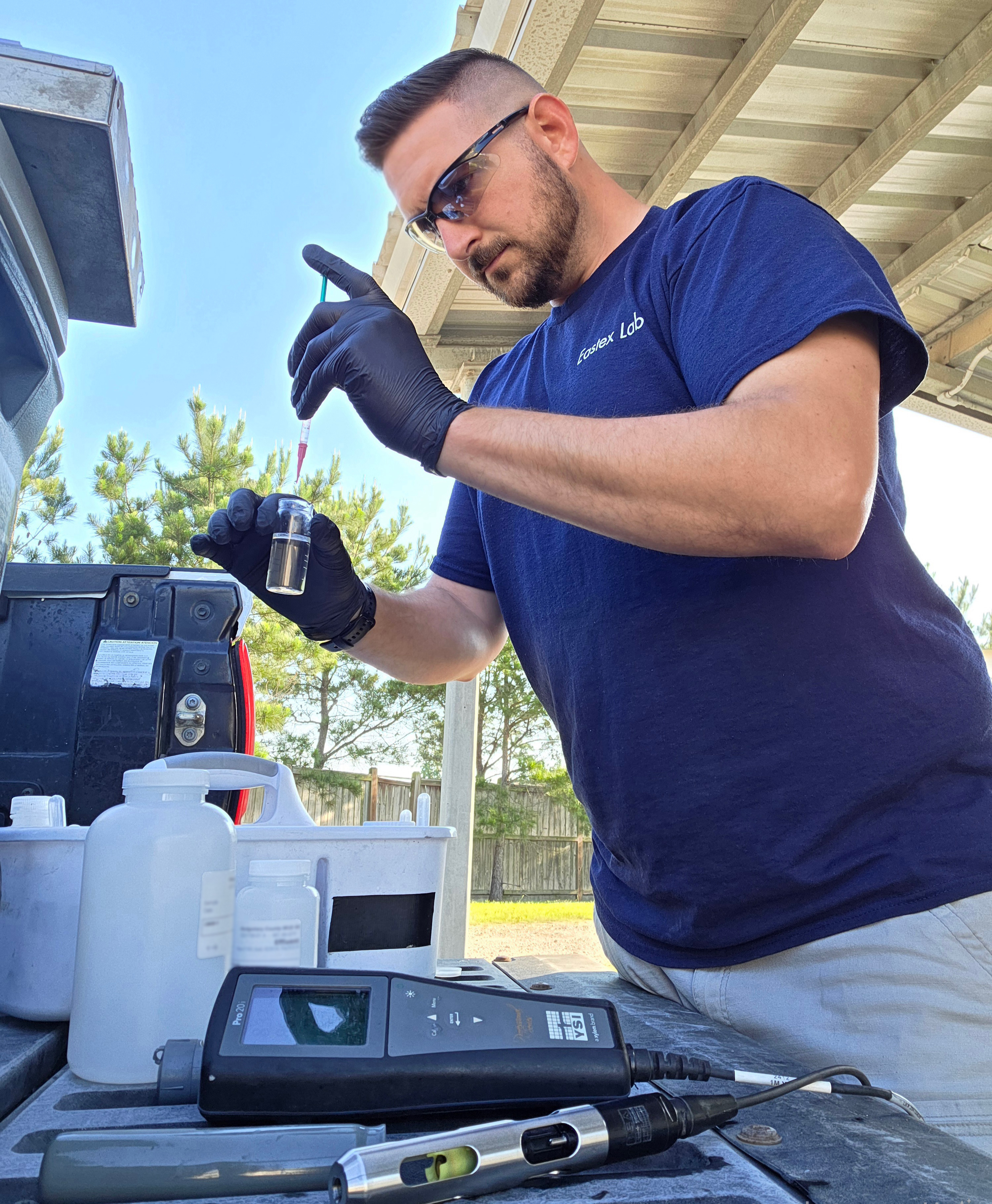 Eastex field technician performing dissolved oxygen titration during a site sampling visit